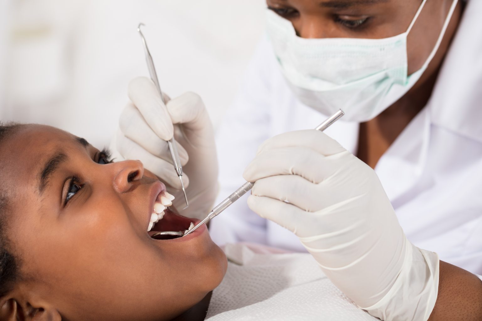 African Girl With Mouth Open During Oral Checkup