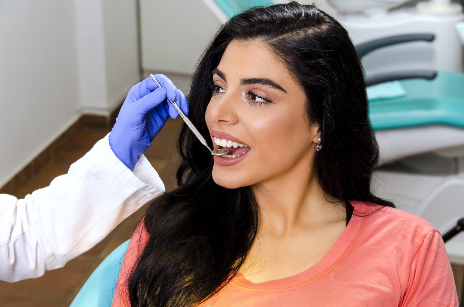 Beautiful Young Caucasian Woman In Her Twenties At Dental Office, Dental Check Up